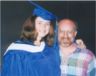 Becky hugs Ed after graduation